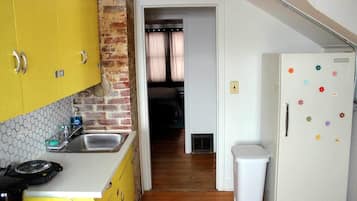 Fridge, microwave, stovetop, coffee/tea maker