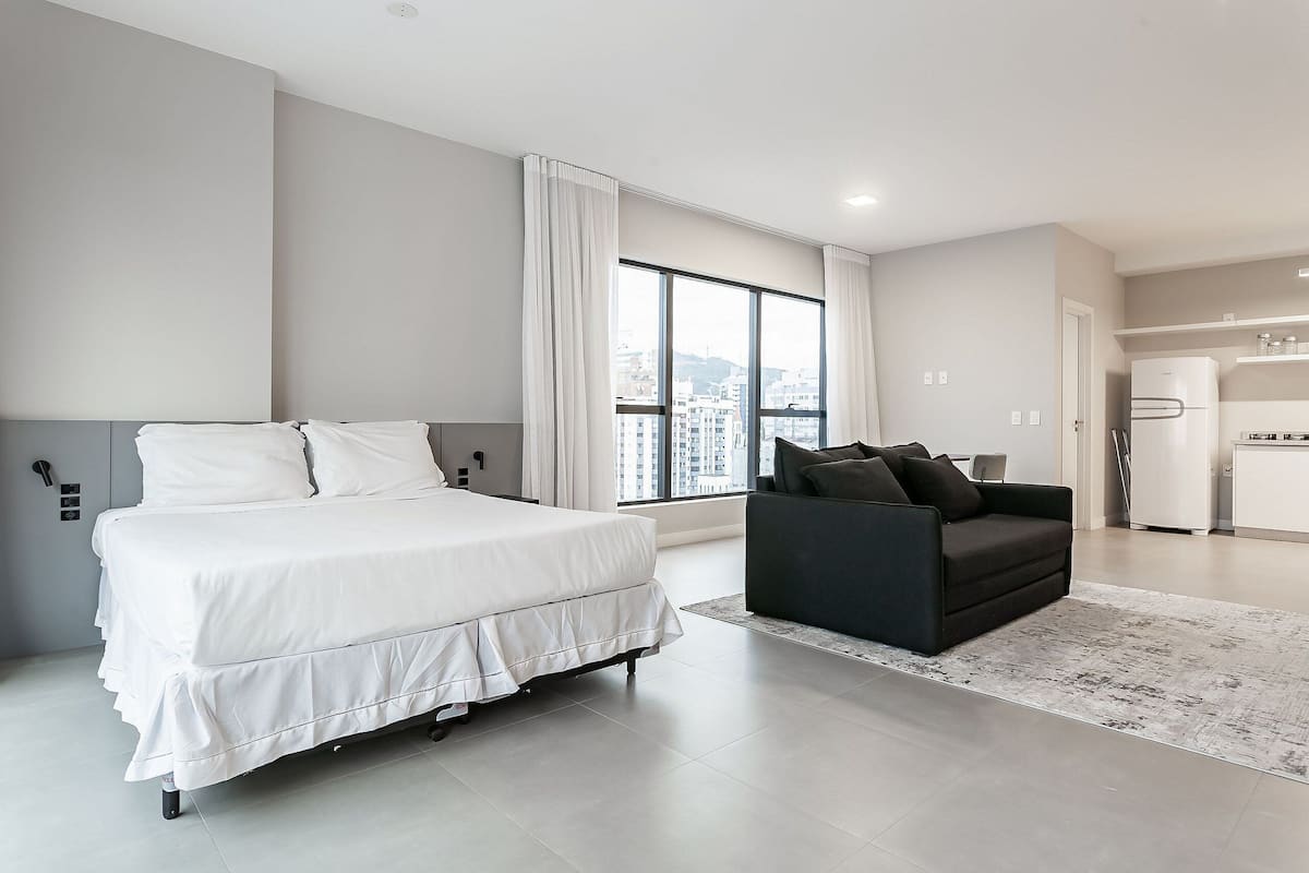 Basic Studio | Laptop workspace, blackout drapes, iron/ironing board, free WiFi