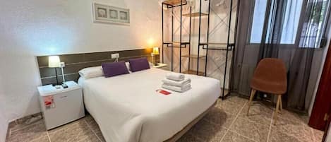 Double Room, Private Bathroom | Minibar, desk, iron/ironing board, free WiFi
