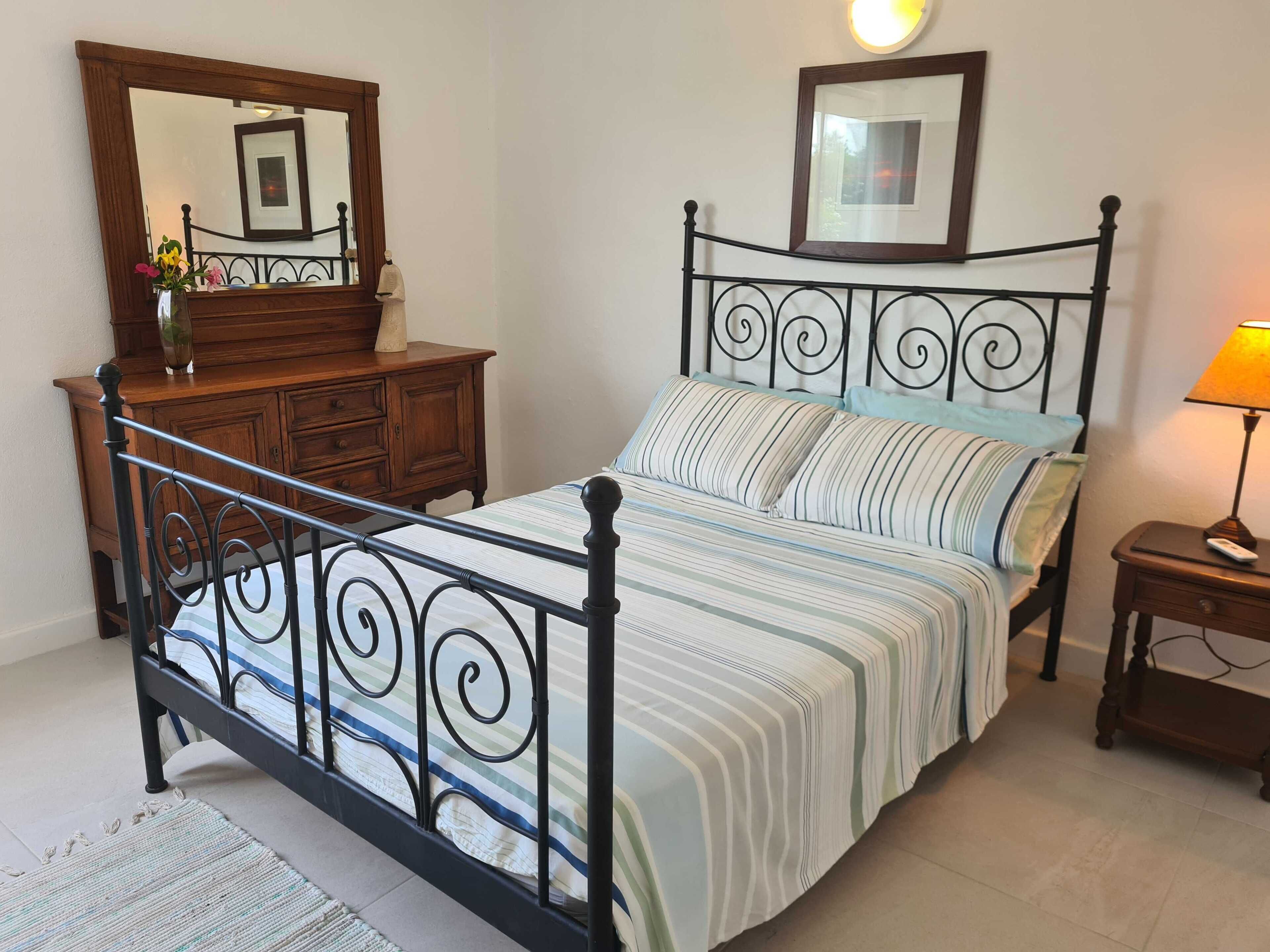 Modern Waterfront Villa Jolly Harbour ~ 5 mins to Beach Sea Views!