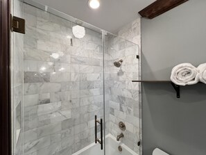 Hair dryer, towels, soap, shampoo