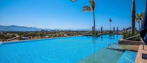 Outdoor pool, free pool cabanas, pool umbrellas