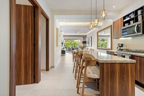 Premier Apartment | Private kitchen | Full-size fridge, microwave, oven, espresso maker - DToscana by Naya Homes (Nuevo Nayarit)