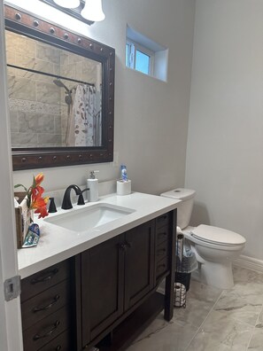 Hair dryer, towels, soap, shampoo