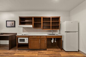 Full-size fridge, microwave, stovetop