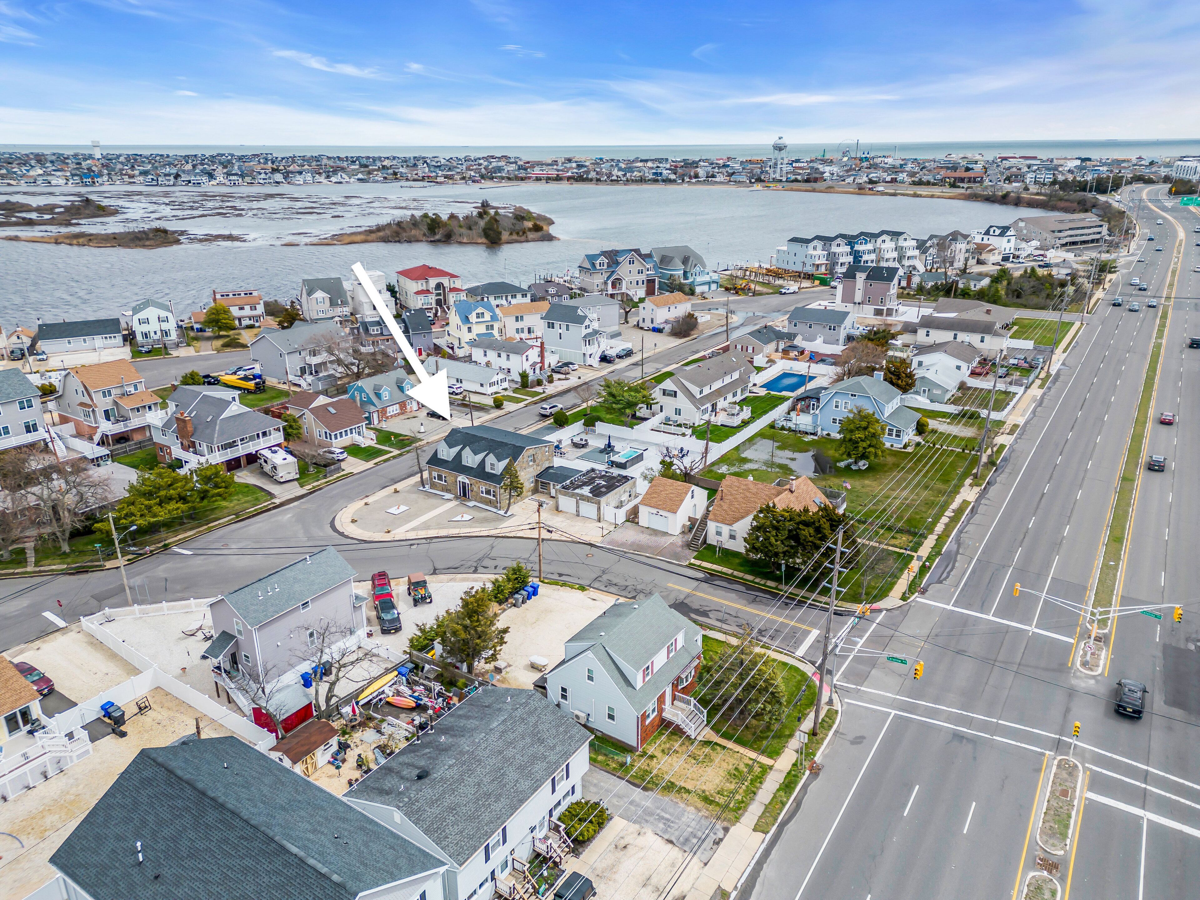 Escape to Paradise! Seaside Heights Home with Swim Spa, Bay Views, & arcade room