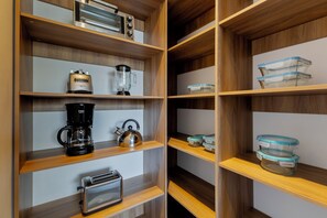 Penthouse Deluxe, 4 habitaciones | Cocina privada | Refrigerador con congelador, microondas, horno y tetera eléctrica