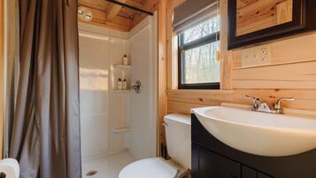 Shower, eco-friendly toiletries, hair dryer, towels