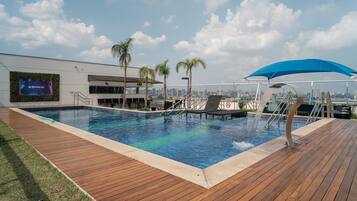 Outdoor pool, pool umbrellas, sun loungers