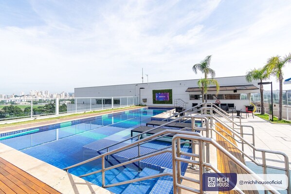 Outdoor pool, pool umbrellas, pool loungers