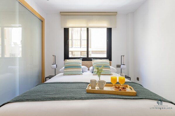 2 slaapkamers, een strijkplank/strijkijzer, internet, beddengoed