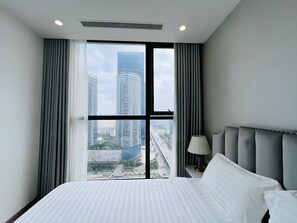 In-room safe, blackout curtains, soundproofing, iron/ironing board - Vinhomes Skylake Ha Noi - Gem Apartment (Hanoi)