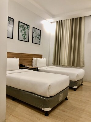 Standard Twin Room, 2 Twin Beds | Premium bedding, down comforters, free WiFi, bed sheets - Bambu Suites (Puerto Princesa)