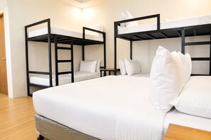 Family Room | Premium bedding, down comforters, free WiFi, bed sheets - Bambu Suites (Puerto Princesa)