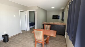 Premium Suite | Individually furnished, laptop workspace, blackout drapes - Riverside Motel & Suites (Medicine Hat)
