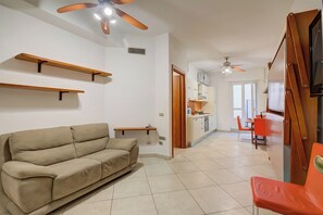 Family Apartment, Multiple Bedrooms (Verbena Apartment 500m from the sea) | Living area | 21-inch flat-screen TV with satellite channels - Verbena with parking 500m from the sea (Alassio)