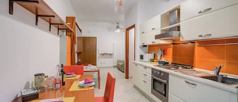 Family Apartment, Multiple Bedrooms (Verbena Apartment 500m from the sea) | Private kitchen | Fridge, stovetop, coffee/tea maker, cookware/dishes/utensils
