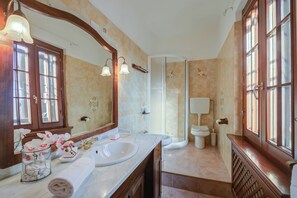 Family Villa, Multiple Bedrooms (Villa Oasi with private pool) | Bathroom | Shower, hair dryer, bidet, towels