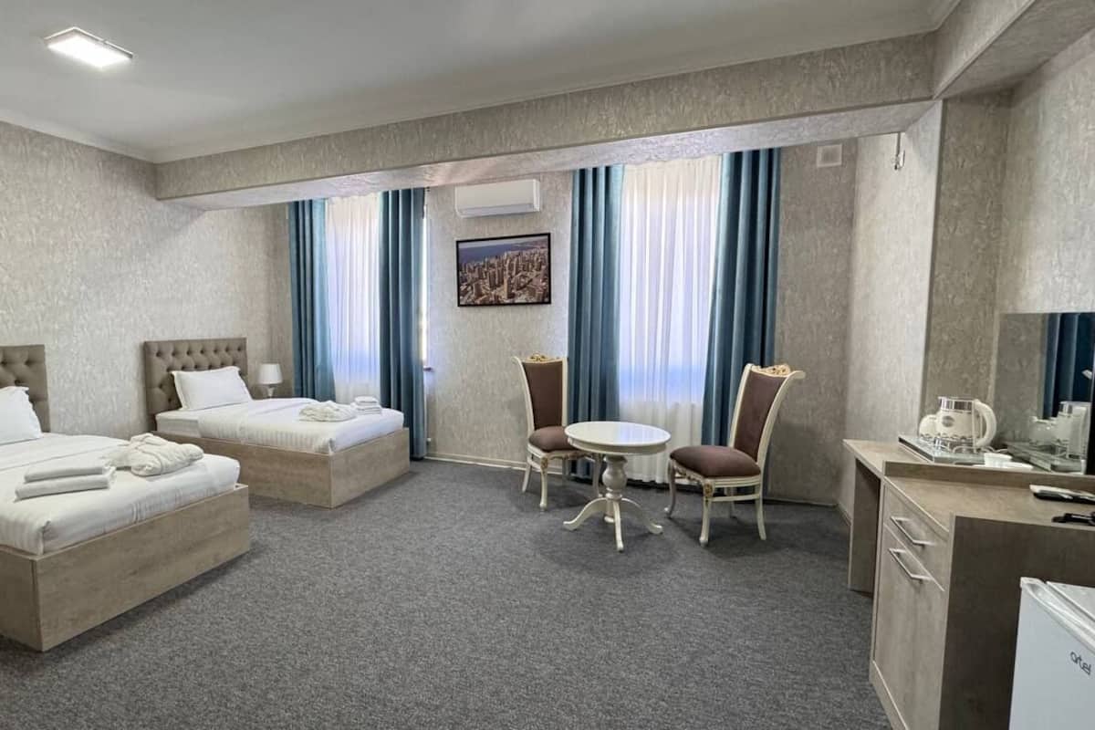 Standard Twin Room | Desk, blackout drapes, soundproofing, iron/ironing board (on request)