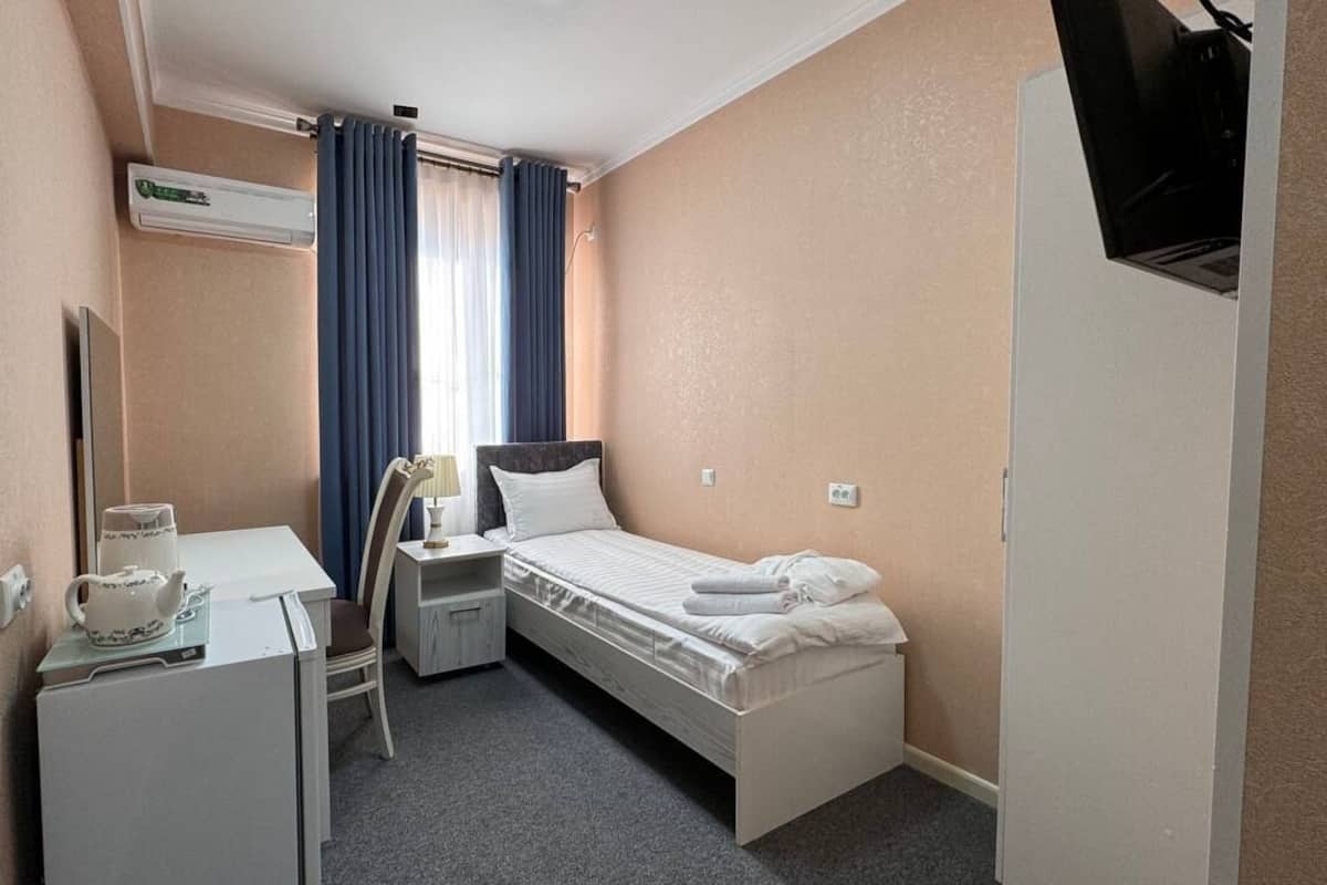 Standard Single Room | Desk, blackout drapes, soundproofing, iron/ironing board (on request)