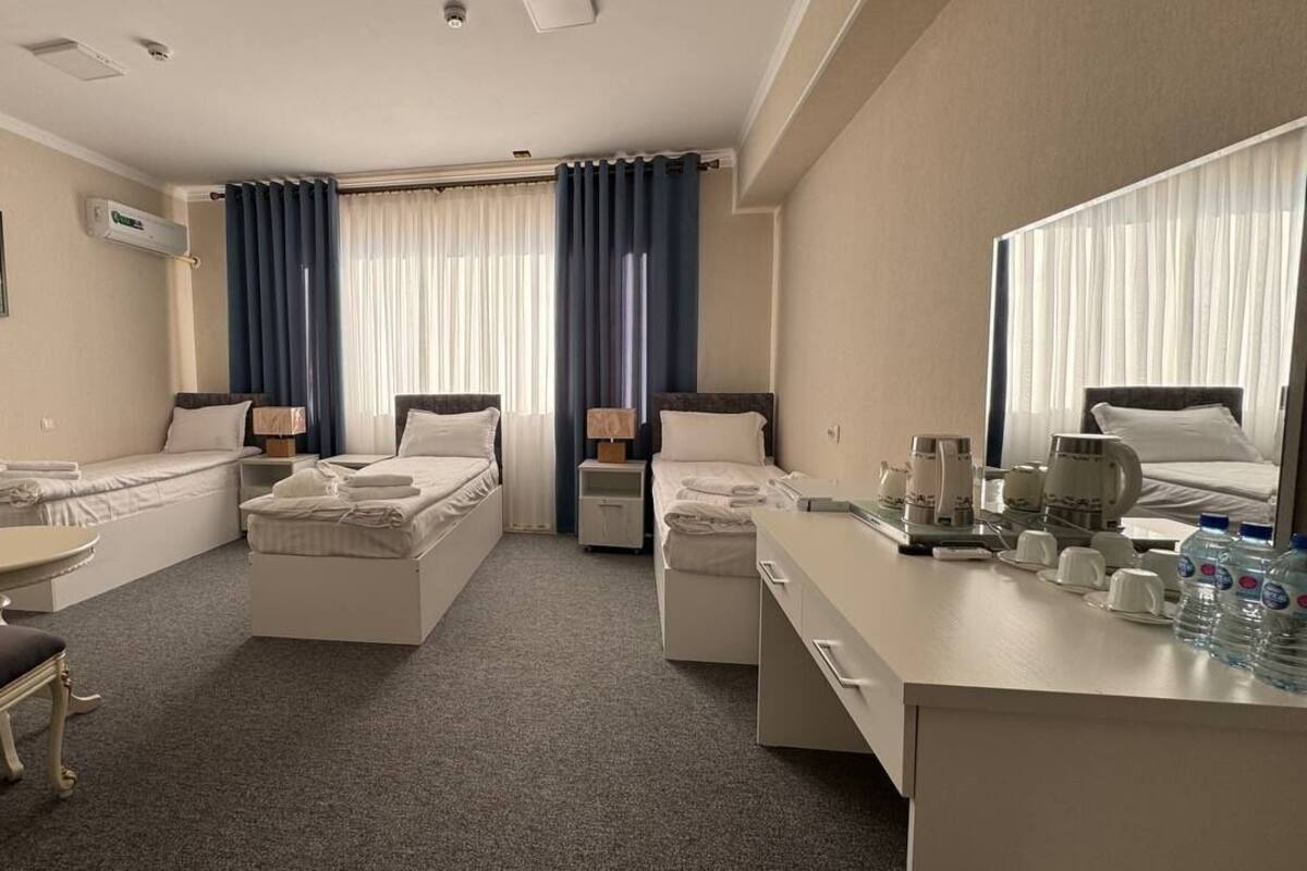 Standard Triple Room | Desk, blackout drapes, soundproofing, iron/ironing board (on request)