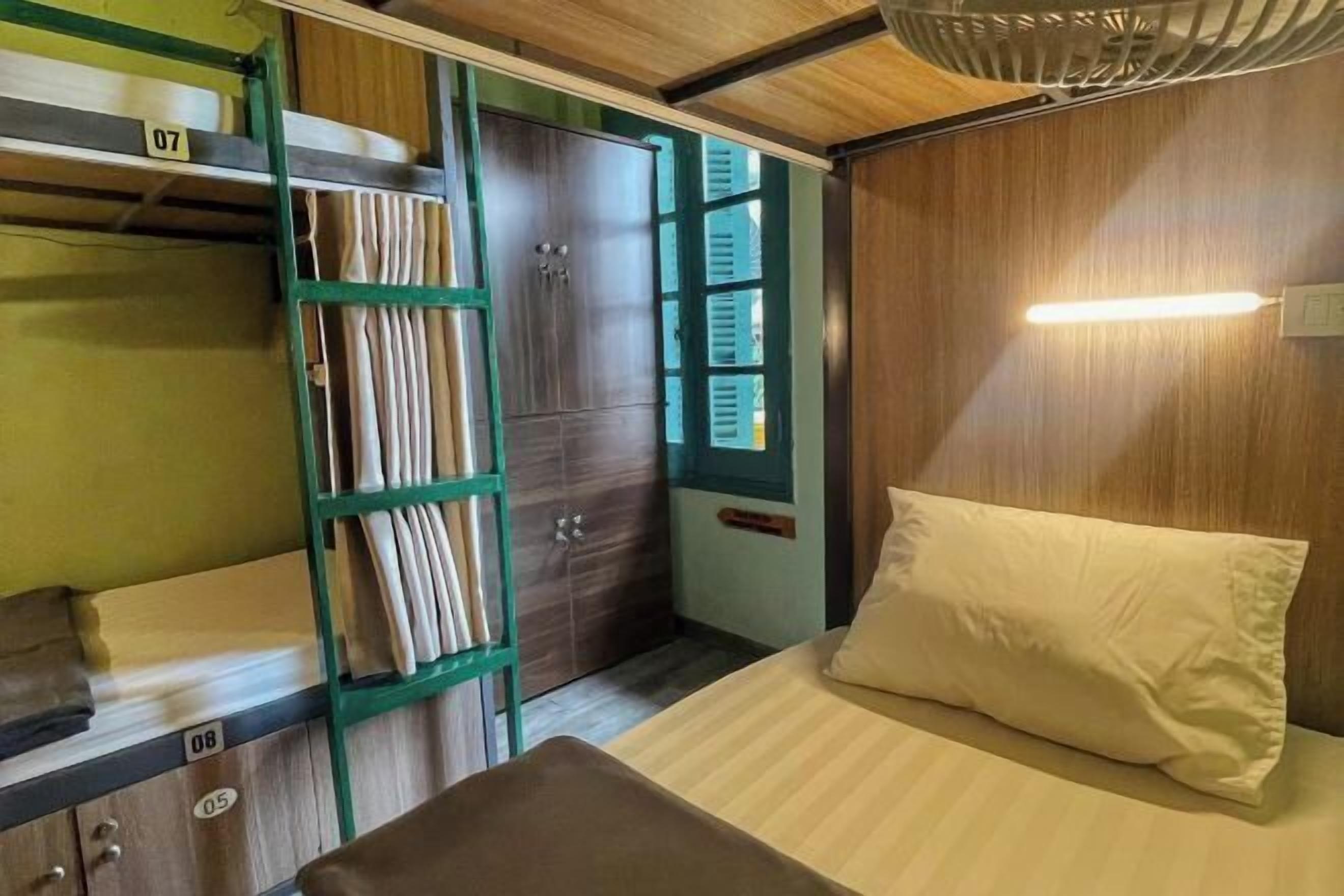 Desk, laptop workspace, free WiFi, bed sheets