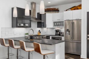 Fridge, microwave, oven, stovetop - Condo In the Heart of 12 South & Belmont, 3 miles to Downtown (Nashville)