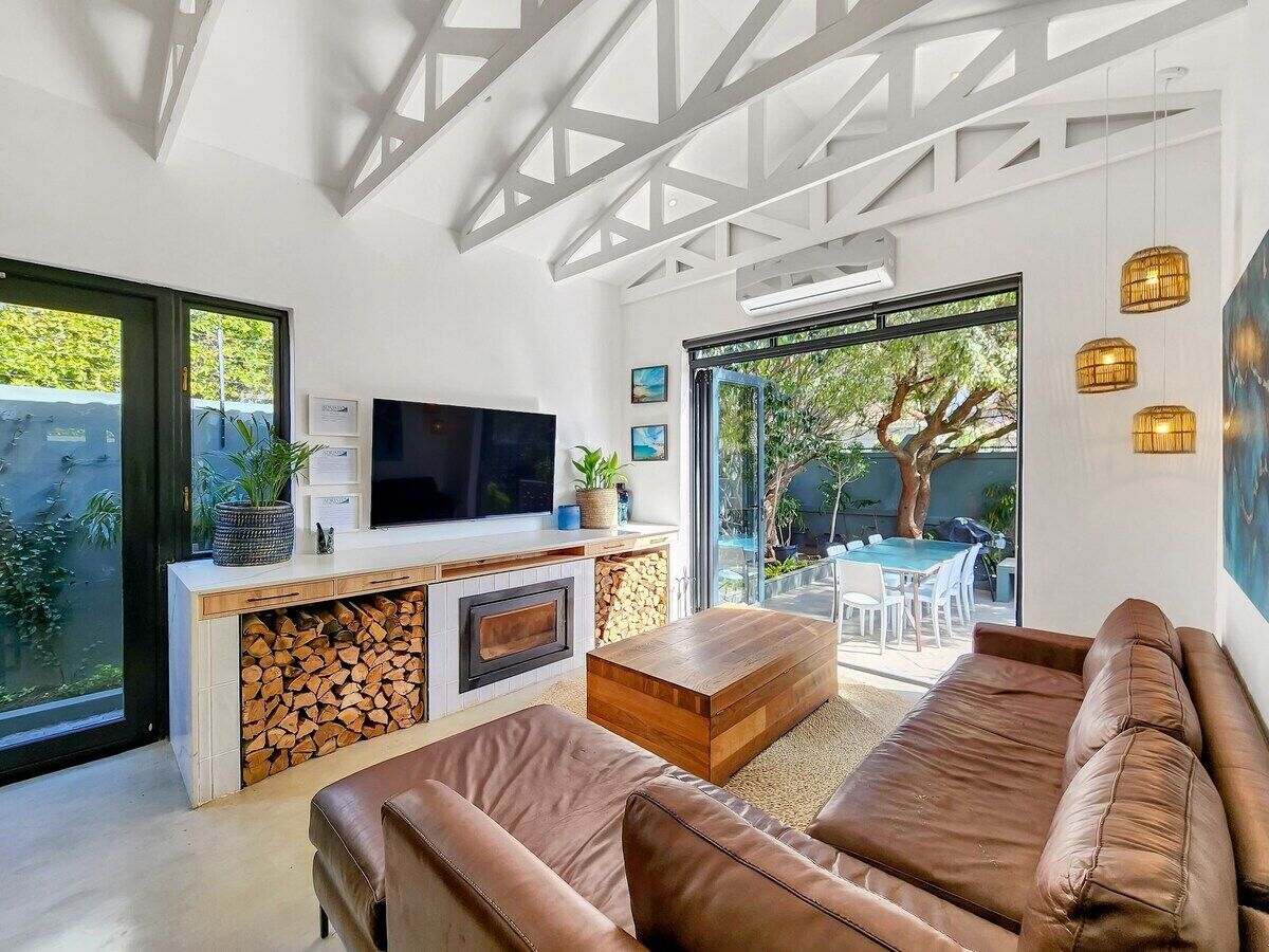 TV, fireplace, books, stereo