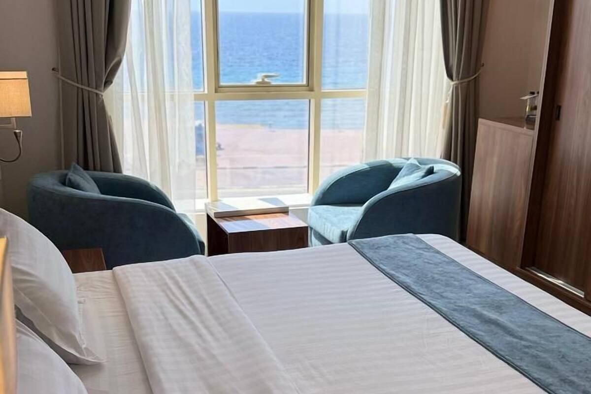 Suite Deluxe, 1 cama King size, para fumadores, vista al mar | 1 habitación, ropa de cama hipoalergénica y minibar