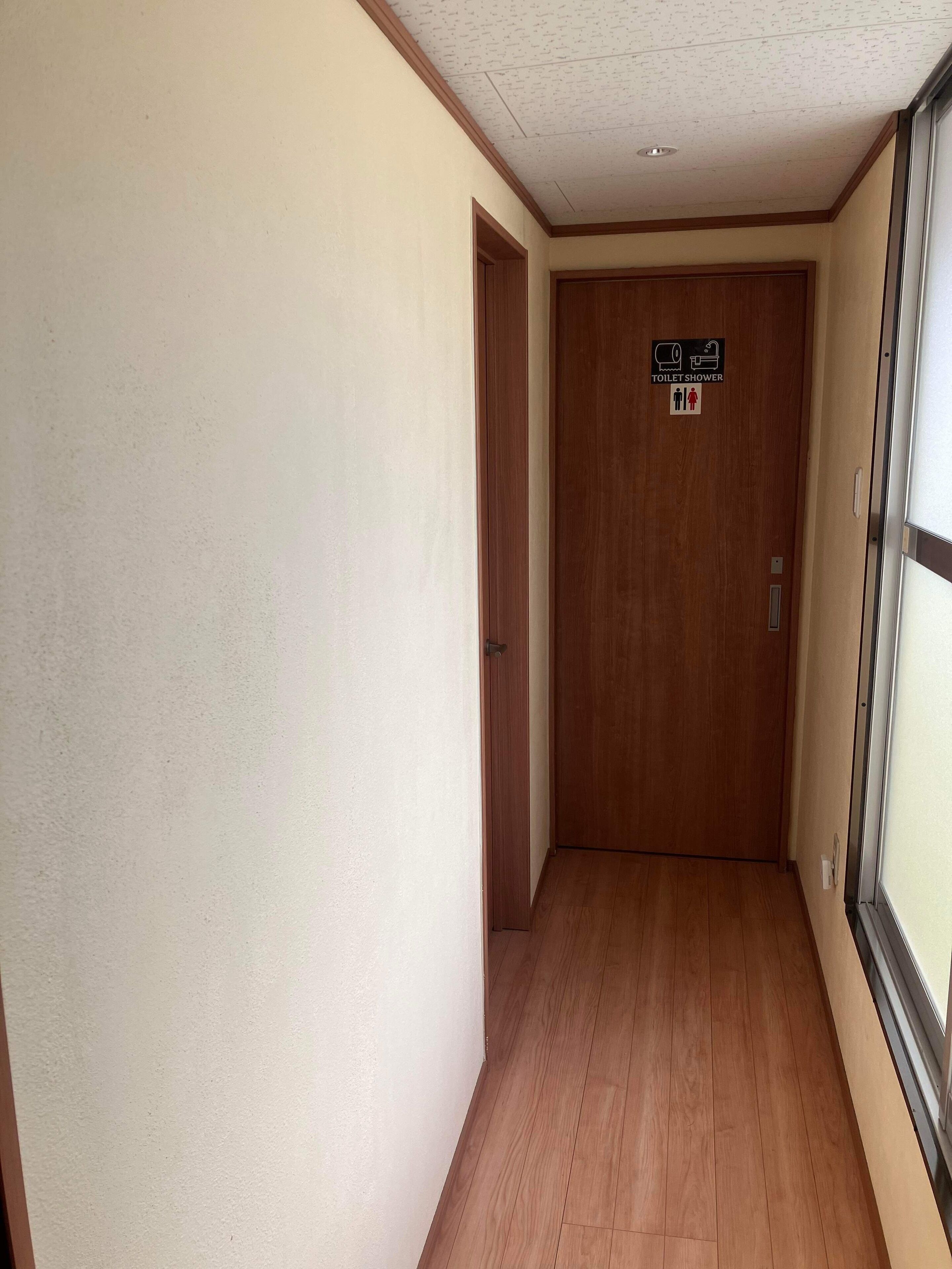 Economy Shared Dormitory | Bathroom | Rainfall showerhead, free toiletries, hair dryer, towels