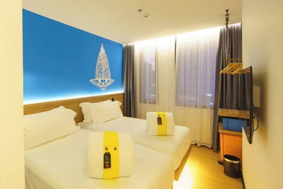 Een kluis op de kamer, gratis wifi, beddengoed