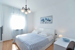 1 bedroom, iron/ironing board, travel crib