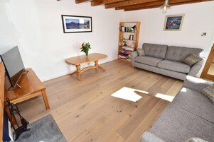 Cottage | Living area | TV, fireplace