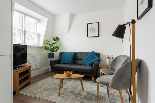 Basic Apartment, 1 Bedroom | Living area | 42-inch Smart TV with cable channels, streaming services