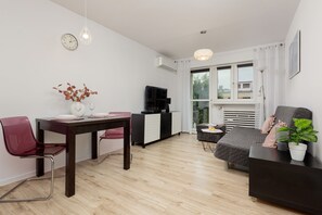 Apartamento, 1 quarto, sacada | Área de estar