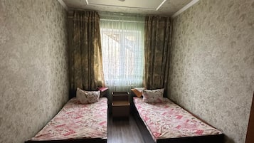 Eenvoudige kamer, 1 twee- of 2 eenpersoonsbedden | Beddengoed