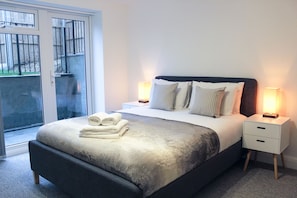 Apartment, 1 Bedroom | 1 bedroom, in-room safe, laptop workspace, iron/ironing board - West Finchley by Viridian Apartments (London)