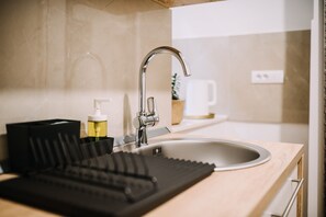 Comfort-Apartment | Eigene Küche | Mini-Kühlschrank, Wasserkocher mit Kaffee-/Teezubehör, Wasserkocher