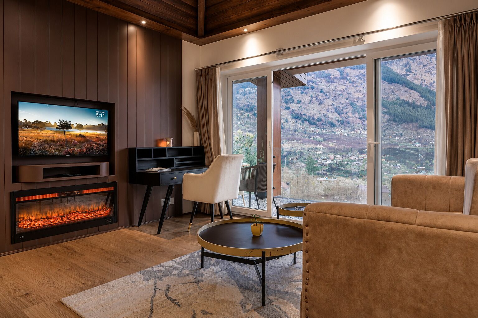 A living room with a fireplace, a television, a desk, and a sofa.