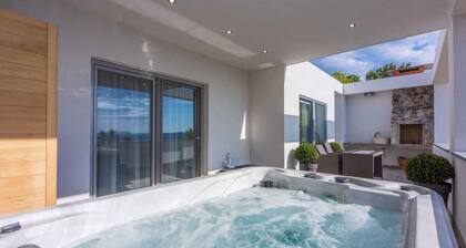 Ferienhaus mit Meerblick, Whirlpool und Sauna