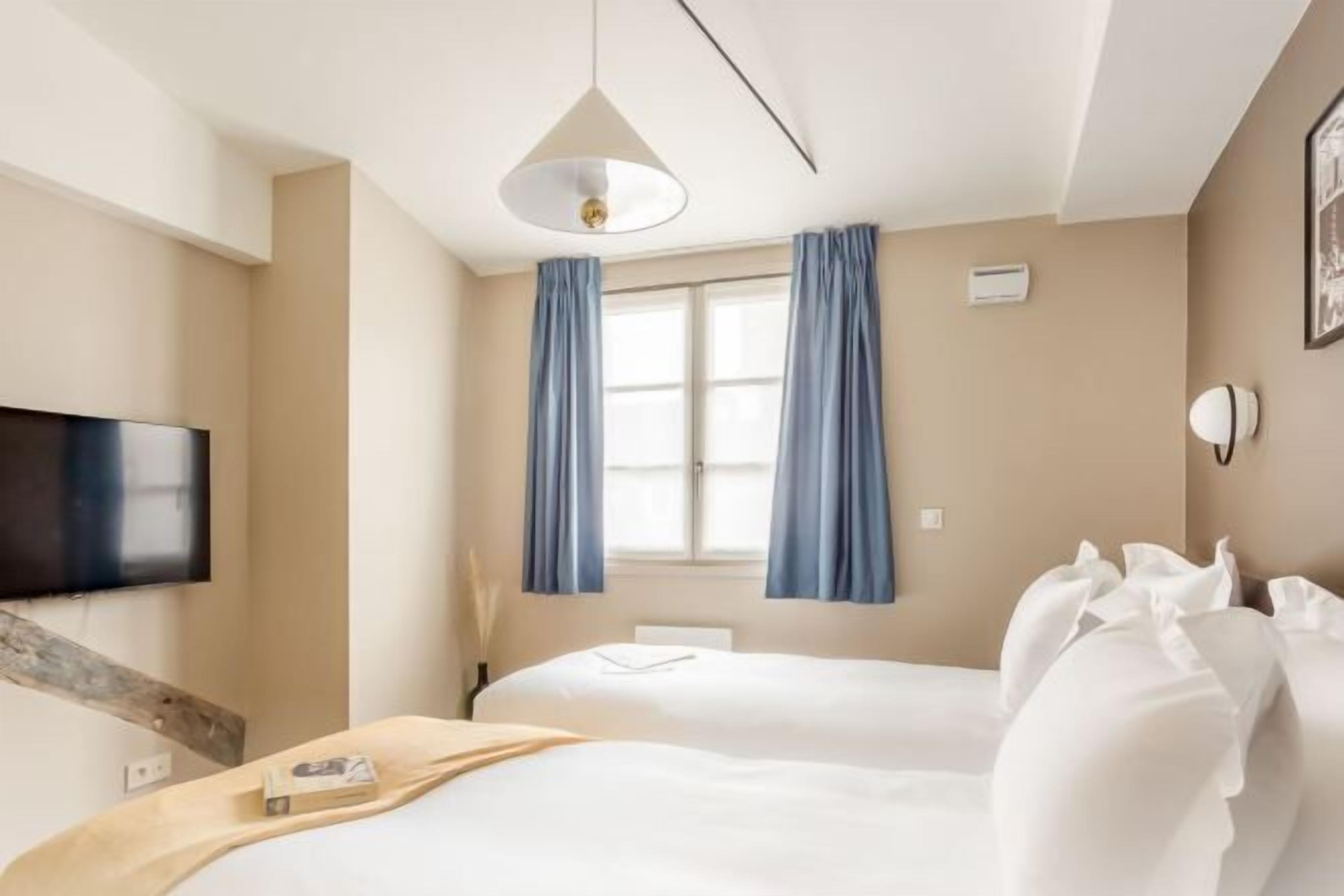 Blackout curtains, iron/ironing board, free WiFi, bed sheets