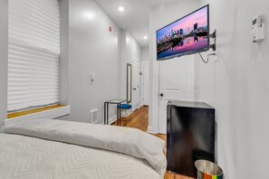 1 habitación, tabla de planchar con plancha, cuna de viaje y wifi