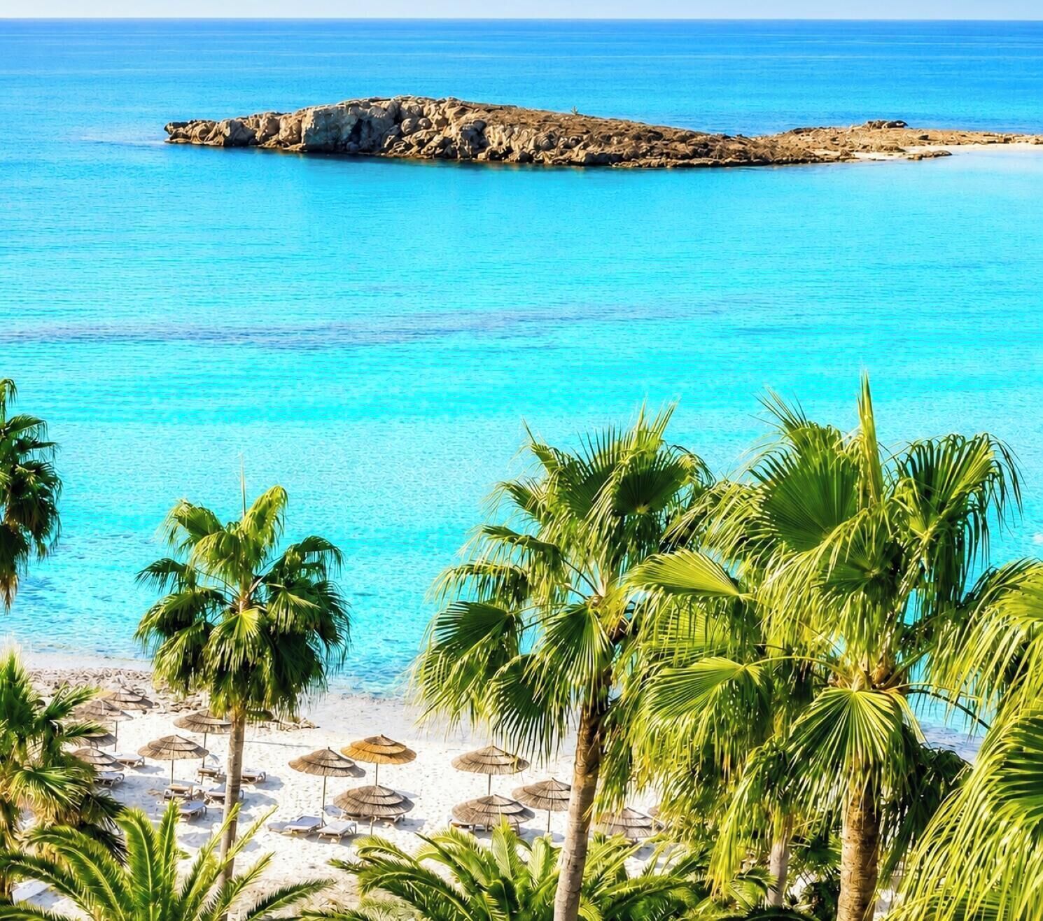 Beach nearby, white sand, beach umbrellas, beach towels