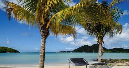 Tranquil Waterfront Villa ~ steps from the Beach, with bikes and terrace views