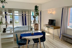 1 bedroom, desk, iron/ironing board, travel crib