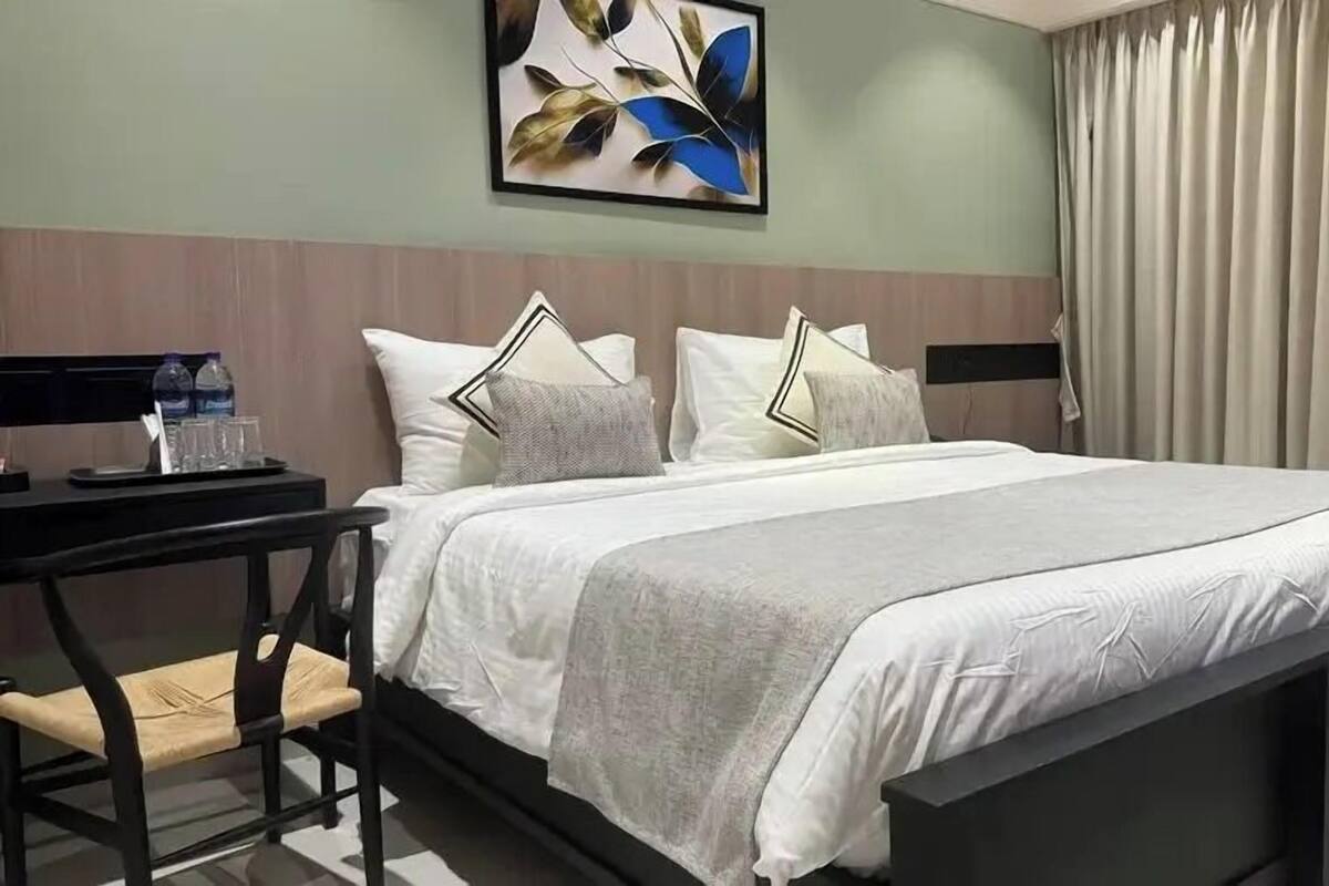 Deluxe Double Room, City View | Hypo-allergenic bedding available, minibar, desk, laptop workspace