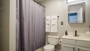 Hair dryer, towels, soap, toilet paper