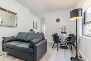 Family Apartment | Living area | 43-inch Smart TV with digital channels