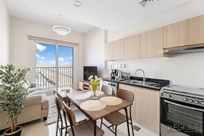 Comfort Apartment | Dining room - WelHome - Breathtaking View 1BR Apt in Damac Hills 2  (Dubai)