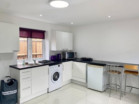Apartment | Private kitchen | Fridge, microwave, stovetop, electric kettle